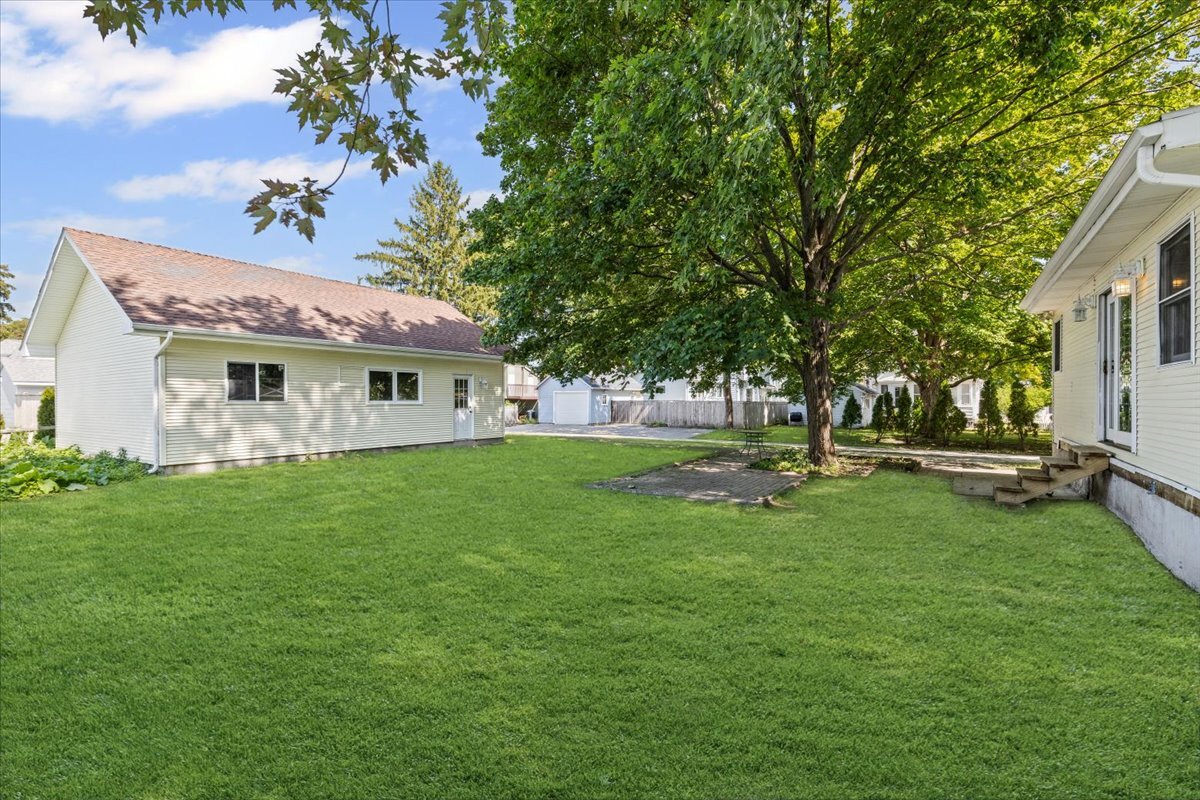 717 Edward Street Sycamore, IL 60178 - Photo 19 of 21 a view of a house with a yard