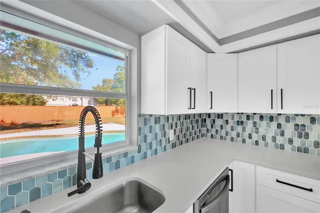 a view of a bathroom with a bathtub