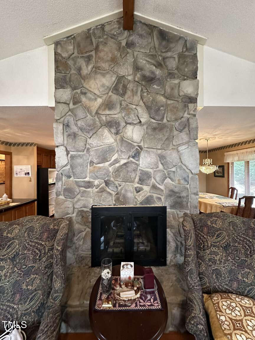 2833 Fox Drive Durham, NC 27712 - Photo 6 of 25 a living room with furniture and a fireplace