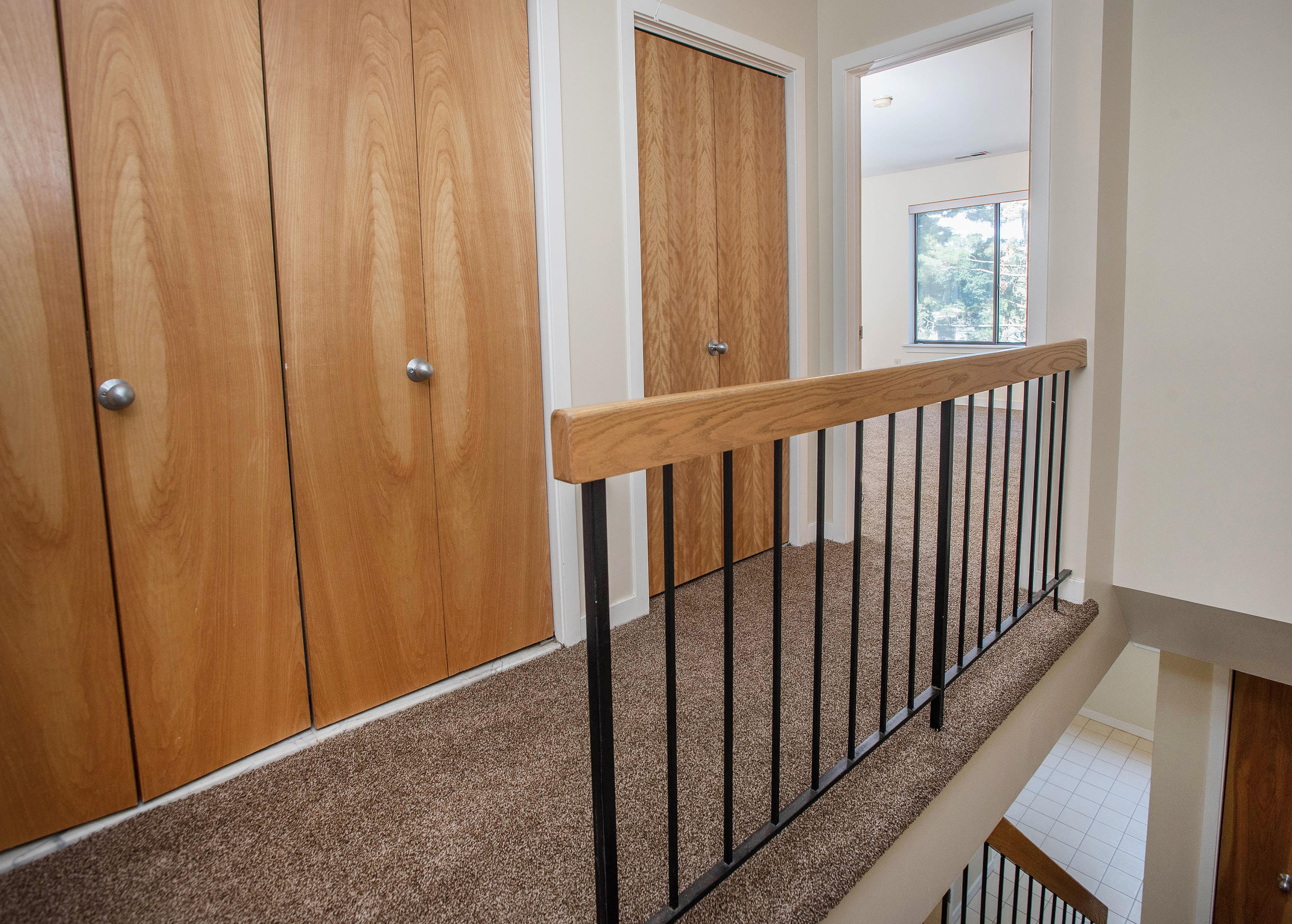 300 Flax Hill Road, Unit 6 Norwalk, CT 06854 - Photo 13 of 18 a view of a hallway with windows