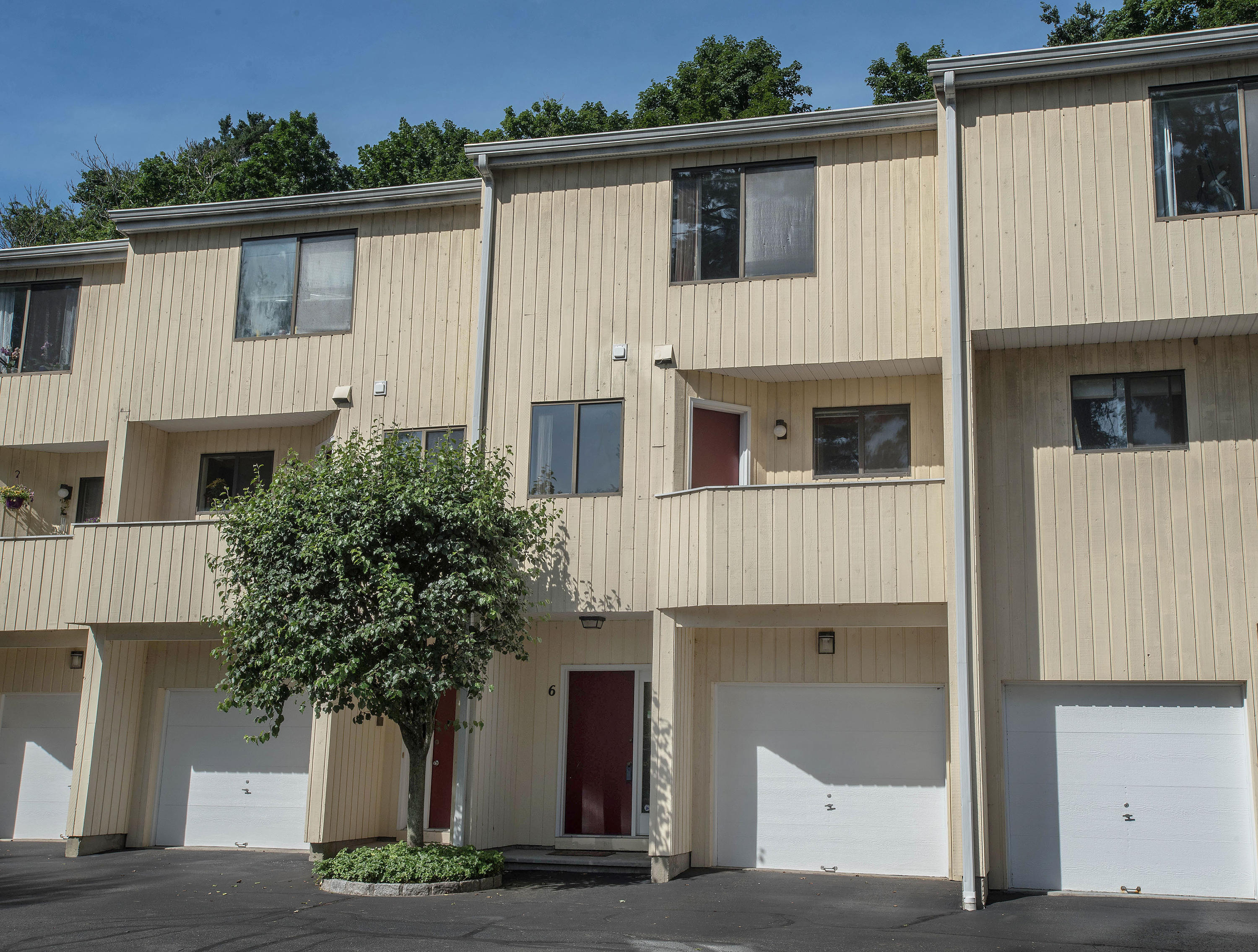 300 Flax Hill Road, Unit 6 Norwalk, CT 06854 - Photo 18 of 18 a view of a house with a garage