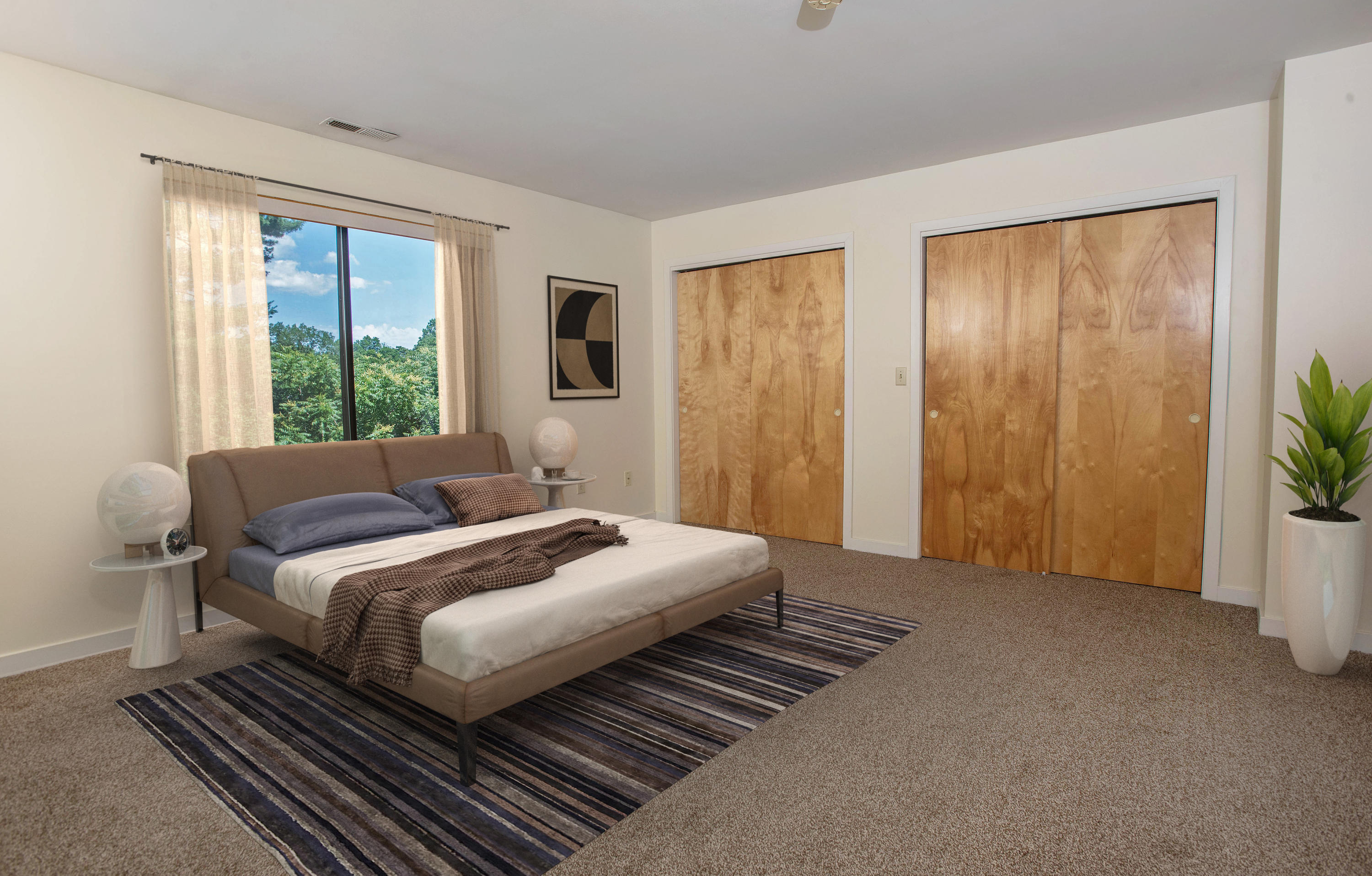 300 Flax Hill Road, Unit 6 Norwalk, CT 06854 - Photo 8 of 18 a bedroom with a bed and a window
