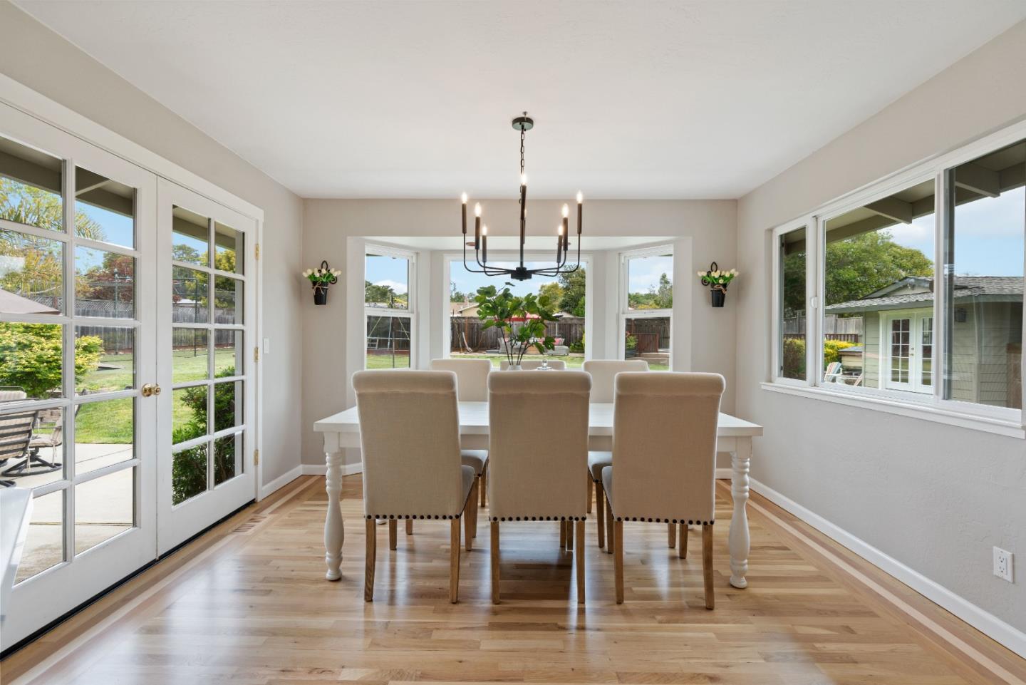 2732 Estates Drive Aptos, CA 95003 - Photo 14 of 63 a dining room with furniture window and wooden floor
