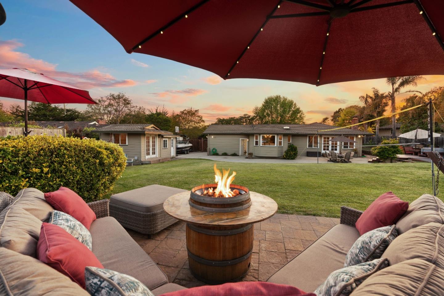 2732 Estates Drive Aptos, CA 95003 - Photo 2 of 63 a view of a patio with couches chairs and a fire pit
