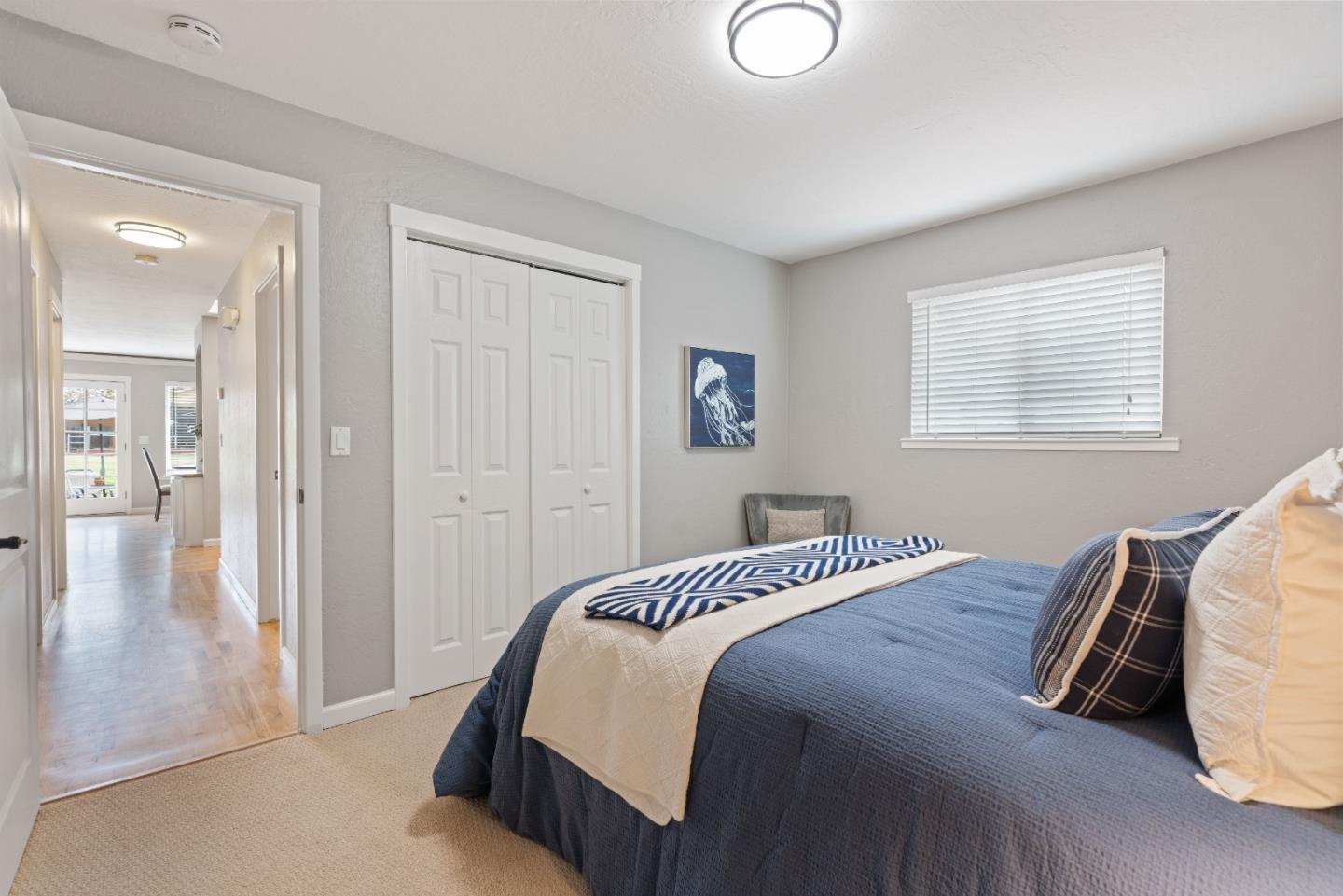 2732 Estates Drive Aptos, CA 95003 - Photo 21 of 63 a bedroom with a bed and a view of bedroom