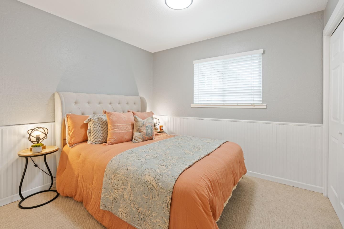 2732 Estates Drive Aptos, CA 95003 - Photo 23 of 63 a bedroom with a bed a table and a window
