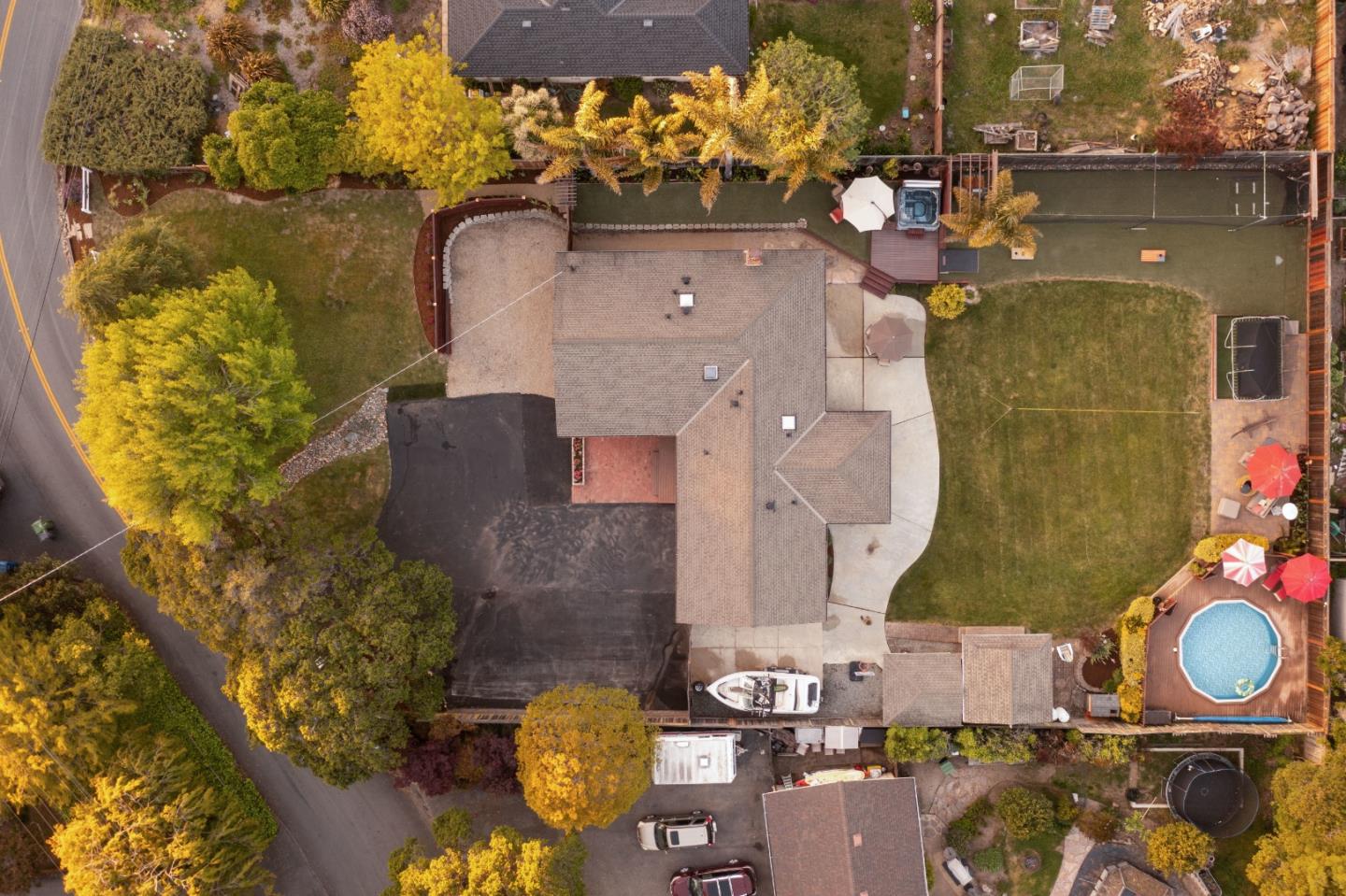 2732 Estates Drive Aptos, CA 95003 - Photo 57 of 63 an aerial view of a house with a swimming pool a yard and a fountain