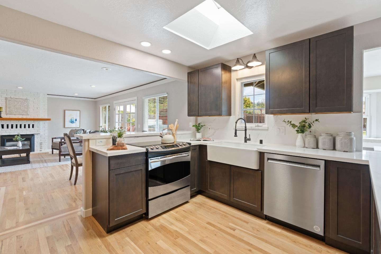 2732 Estates Drive Aptos, CA 95003 - Photo 9 of 63 a kitchen with stainless steel appliances granite countertop a sink stove and cabinets