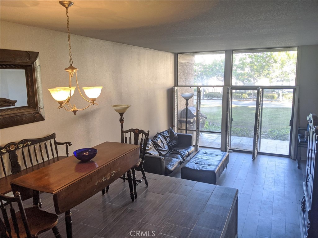 8103 Marina Pacifica Drive North Long Beach, CA 90803 - Photo 3 of 19 View to Living and Patio