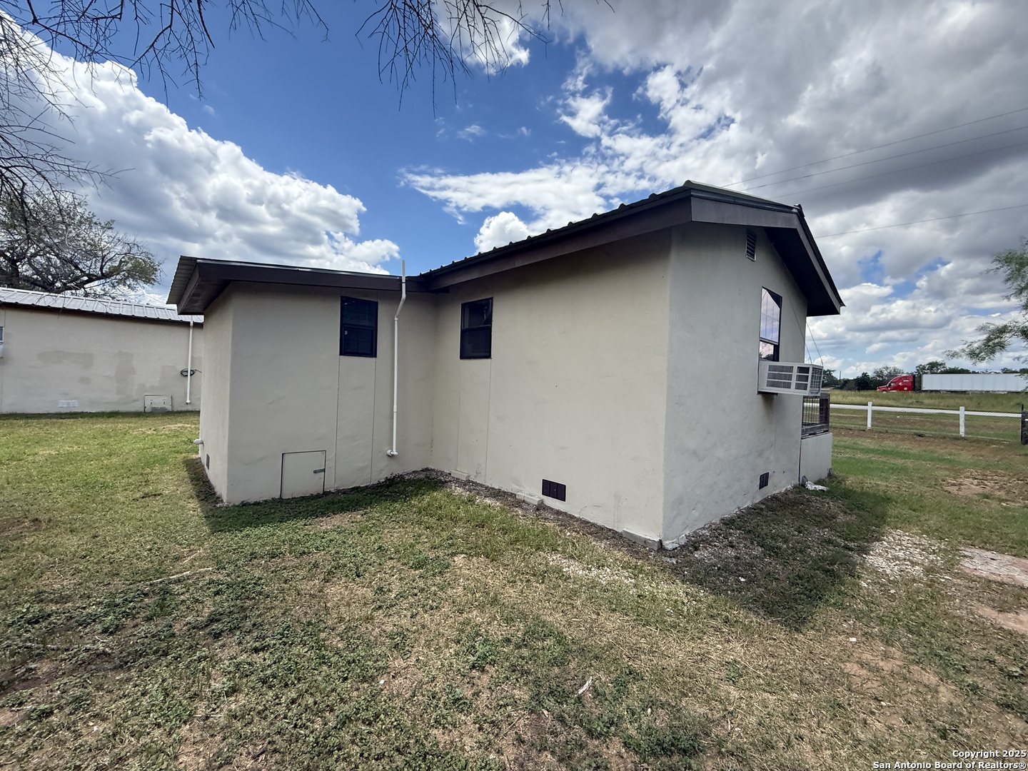 13338 Interstate 35 Moore, TX 78057 - Photo 11 of 37 a house with a yard
