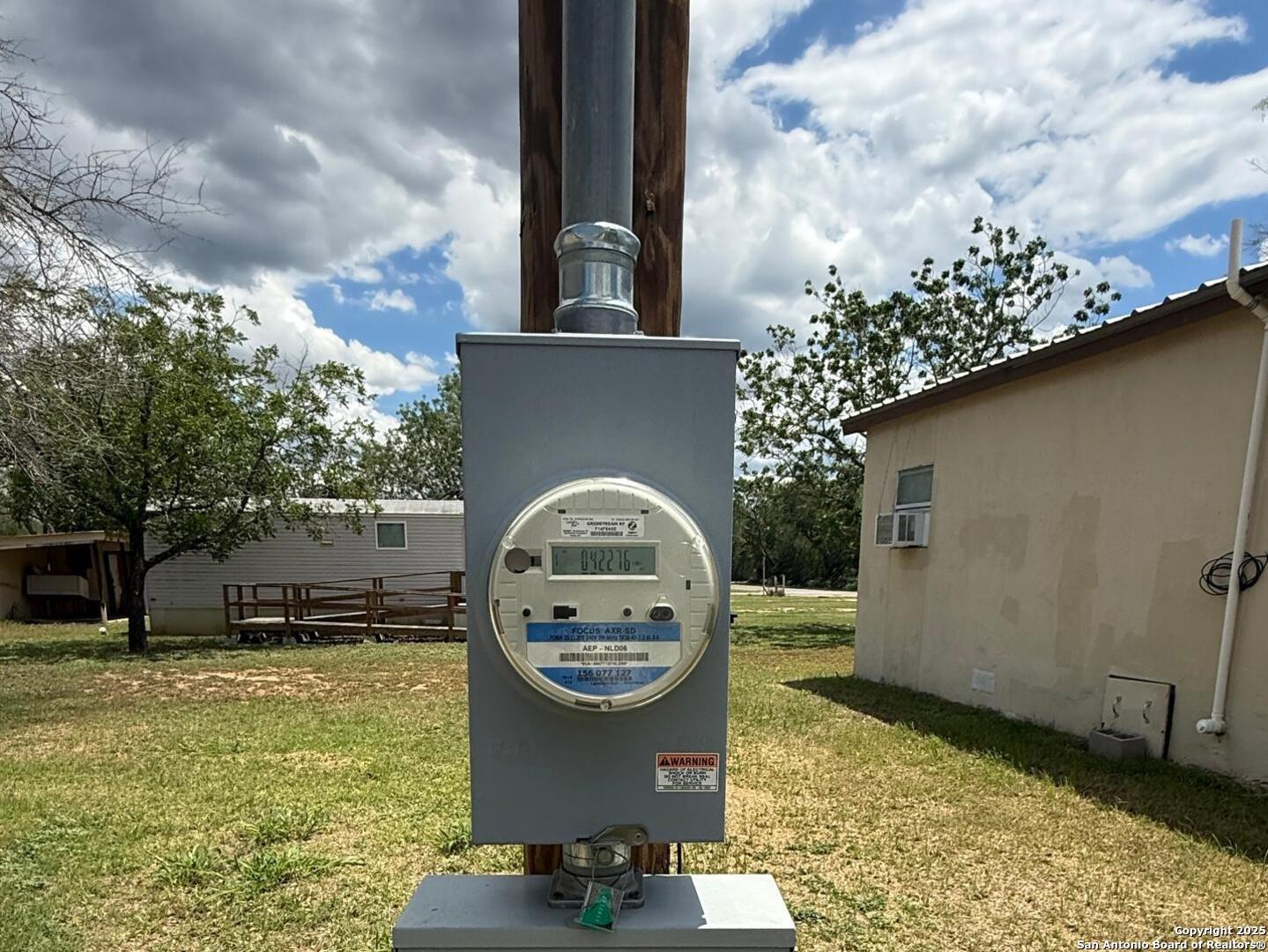 13338 Interstate 35 Moore, TX 78057 - Photo 18 of 37 a front view of a house with garden