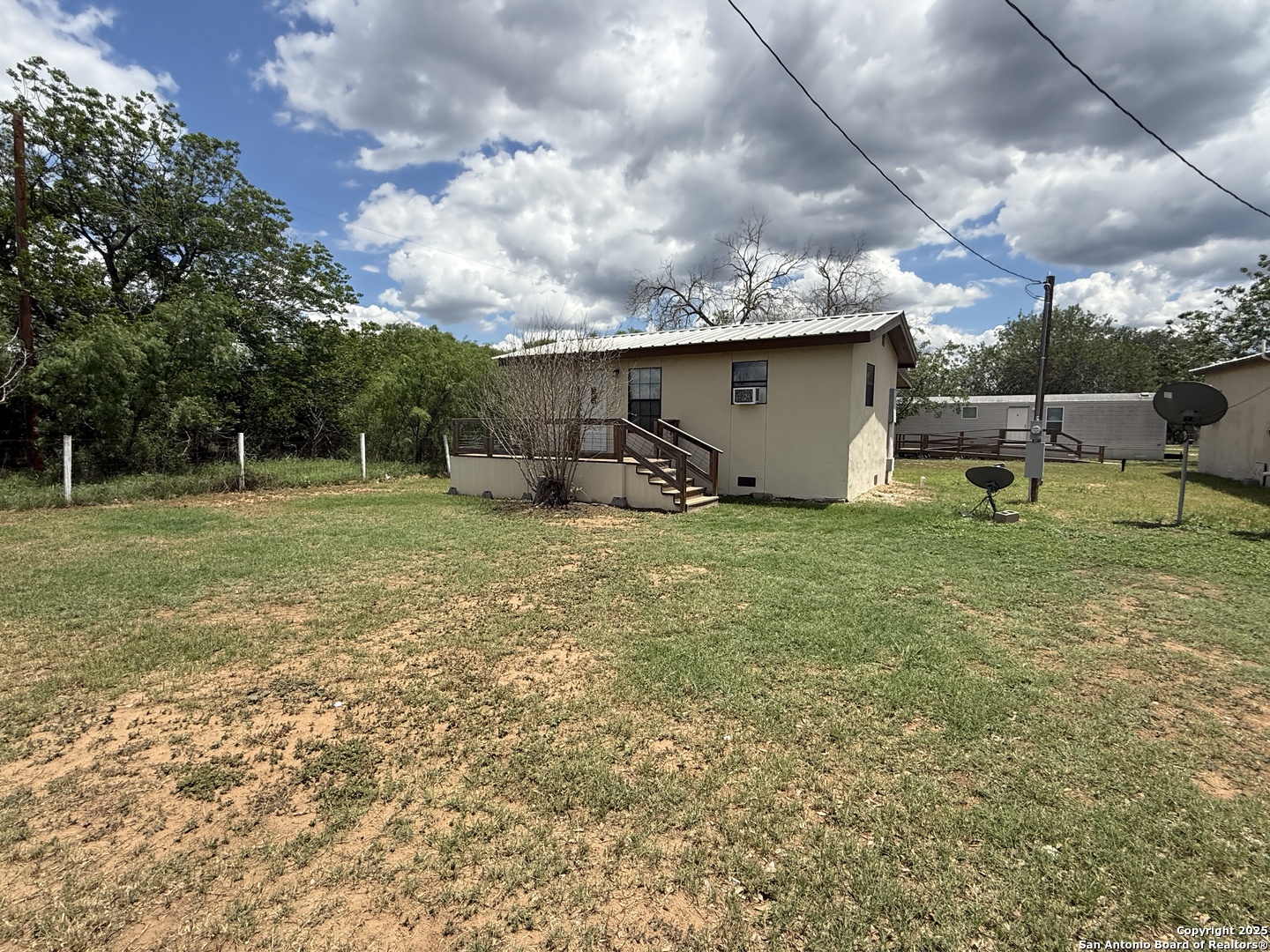 13338 Interstate 35 Moore, TX 78057 - Photo 22 of 37 a view of a backyard