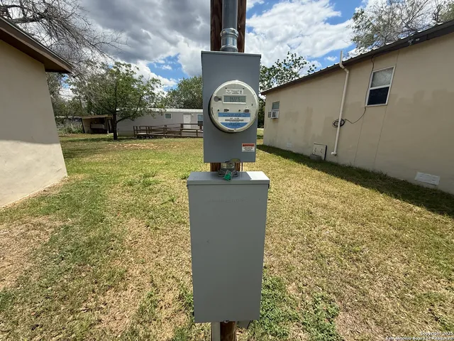 a view of balcony with wooden floor and fence