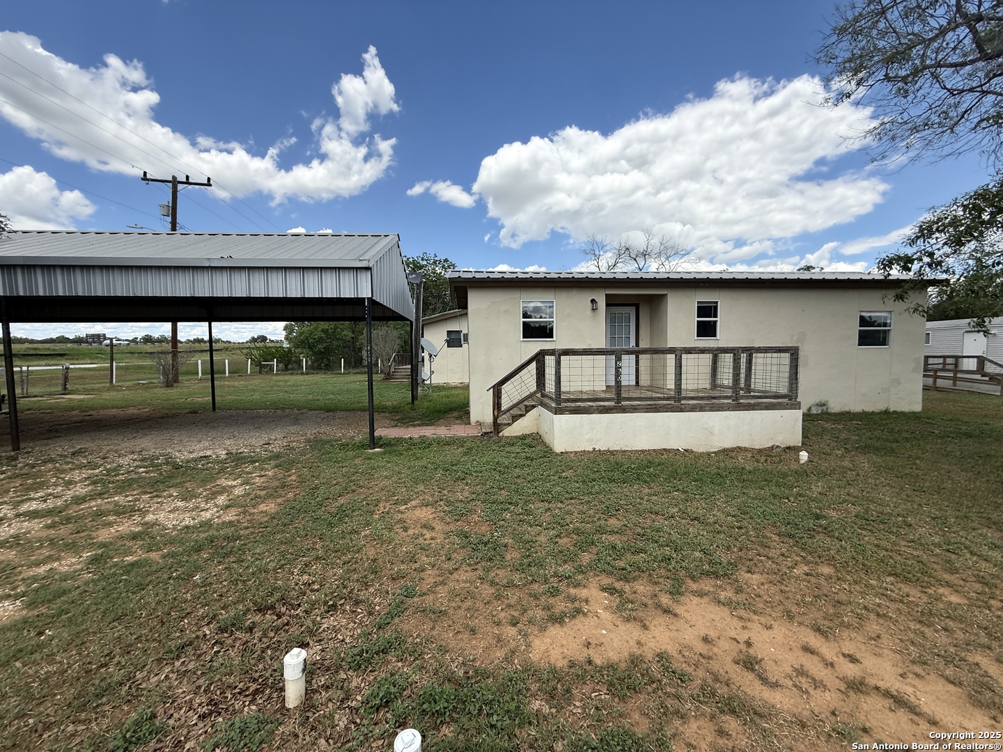 13338 Interstate 35 Moore, TX 78057 - Photo 34 of 37 a view of a house with a yard