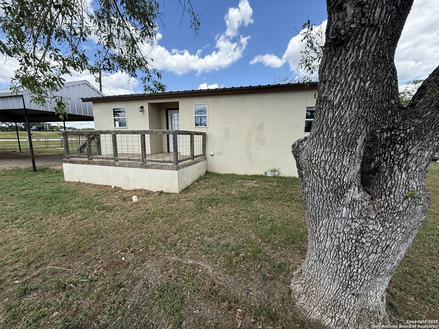 13338 Interstate 35 Moore, TX 78057 - Photo 37 of 37 a view of a house with backyard and sitting area