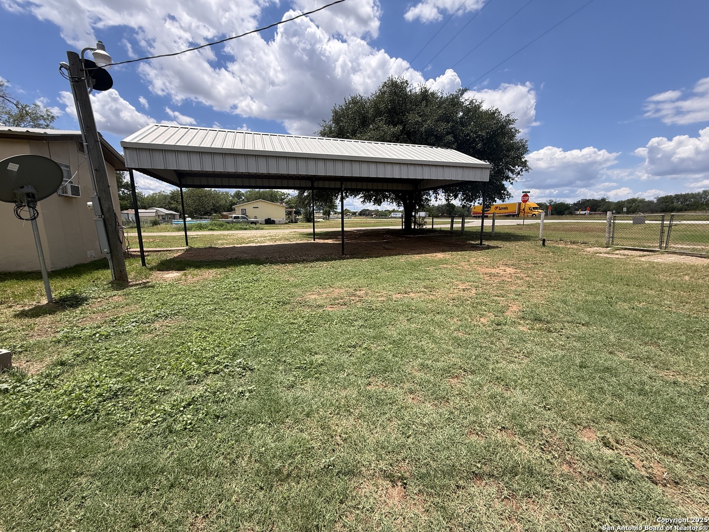 13338 Interstate 35 Moore, TX 78057 - Photo 7 of 37 a view of swimming pool with outdoor seating