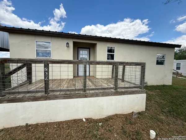 a view of a house with a patio
