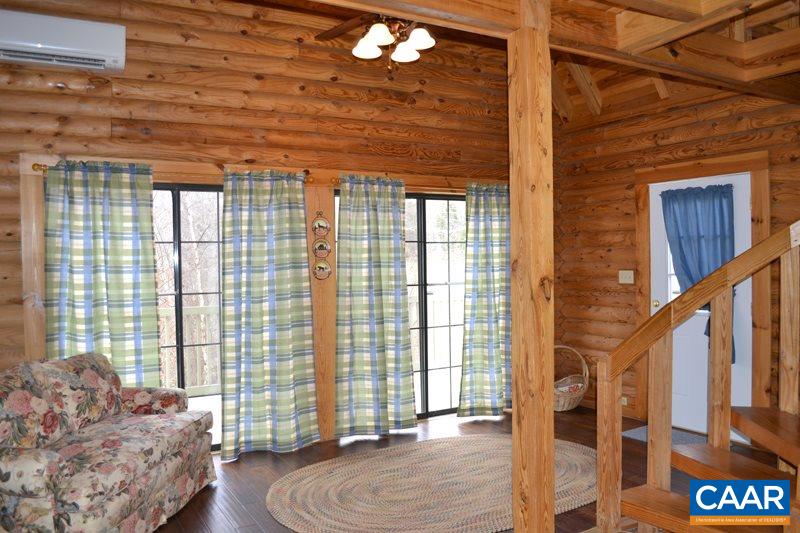 548 Stage Junction Road Columbia, VA 23038 - Photo 2 of 19 a living room with furniture and a window