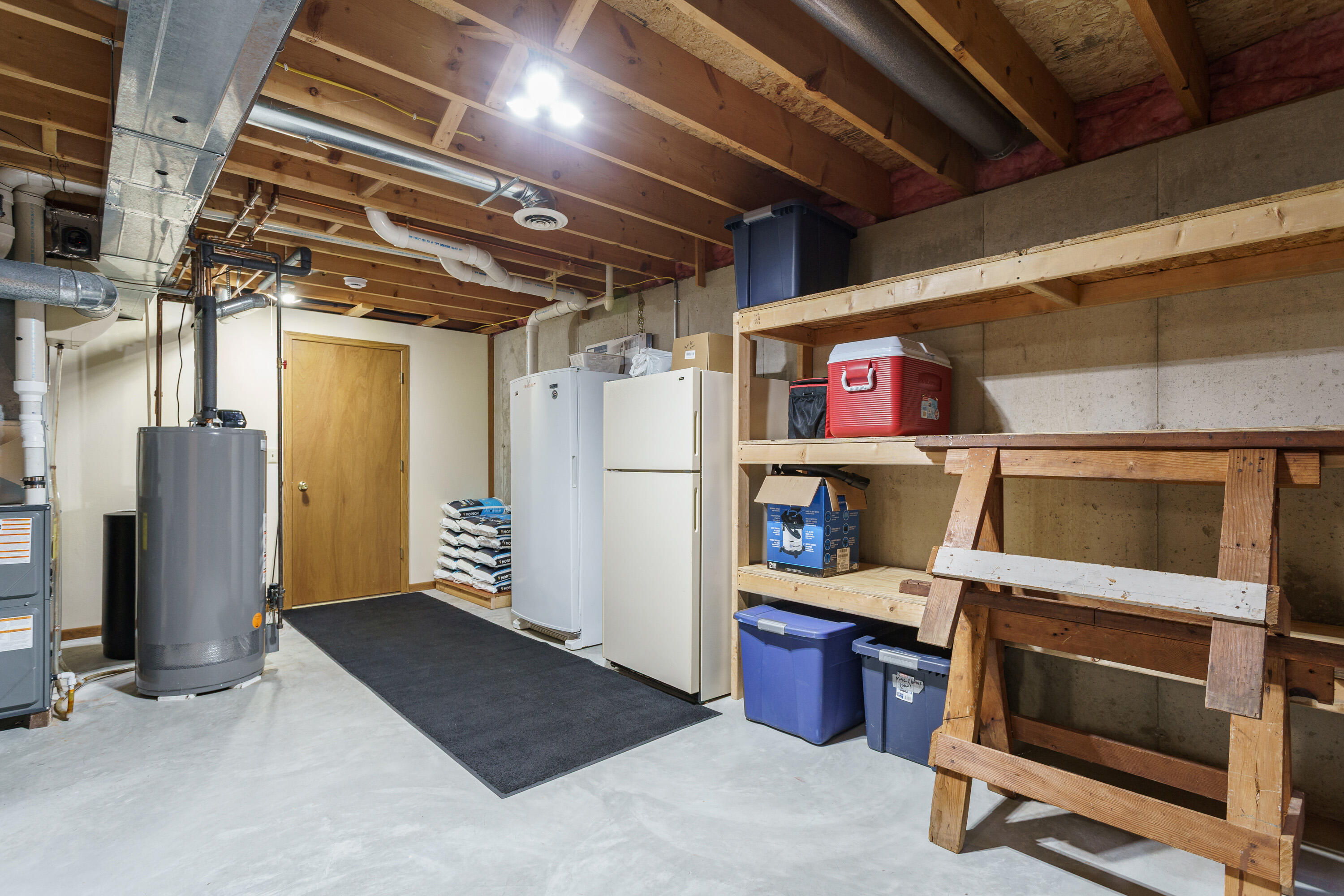 706 Woodbridge Trail Watertown, WI 53094 - Photo 32 of 38 Storage shelving included