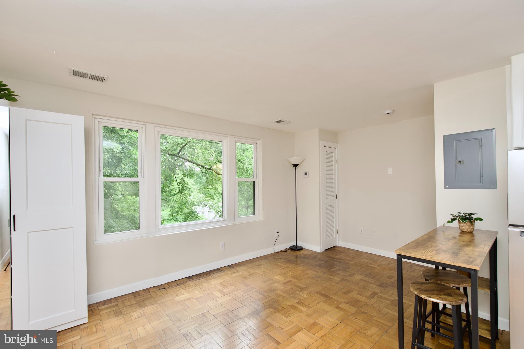 4840 MacArthur Boulevard Northwest, Unit 54 Washington, DC 20007 - Photo 12 of 28 a view of a room that has a window in it