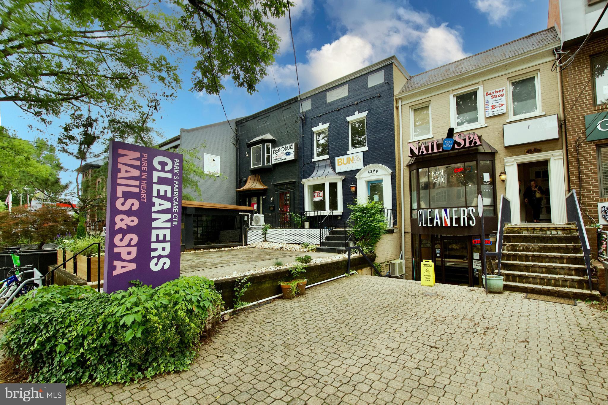 4840 MacArthur Boulevard Northwest, Unit 54 Washington, DC 20007 - Photo 27 of 28 a view of a brick building with many windows