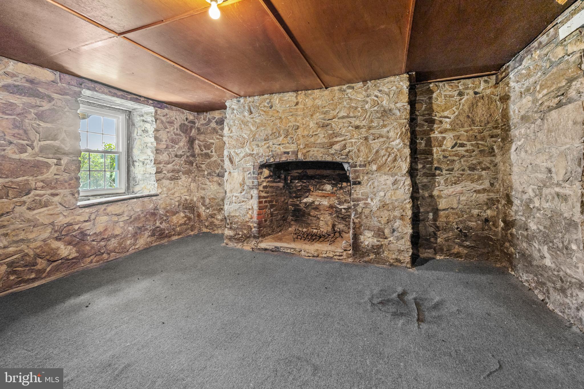 4071 Kabletown Road Charles Town, WV 25414 - Photo 24 of 29 a view of a livingroom with a fireplace