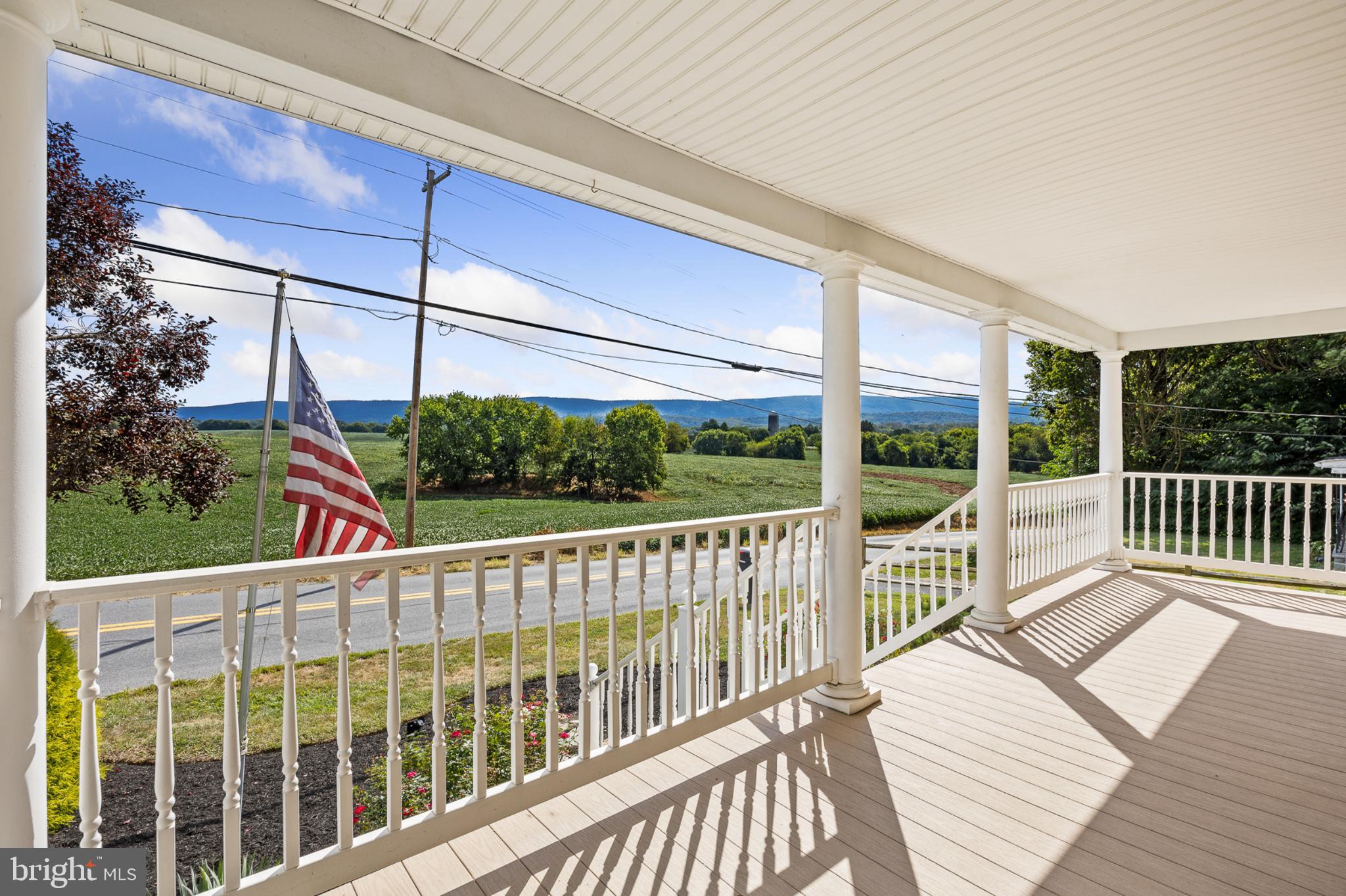 4071 Kabletown Road Charles Town, WV 25414 - Photo 7 of 29 a view of a balcony with wooden floor