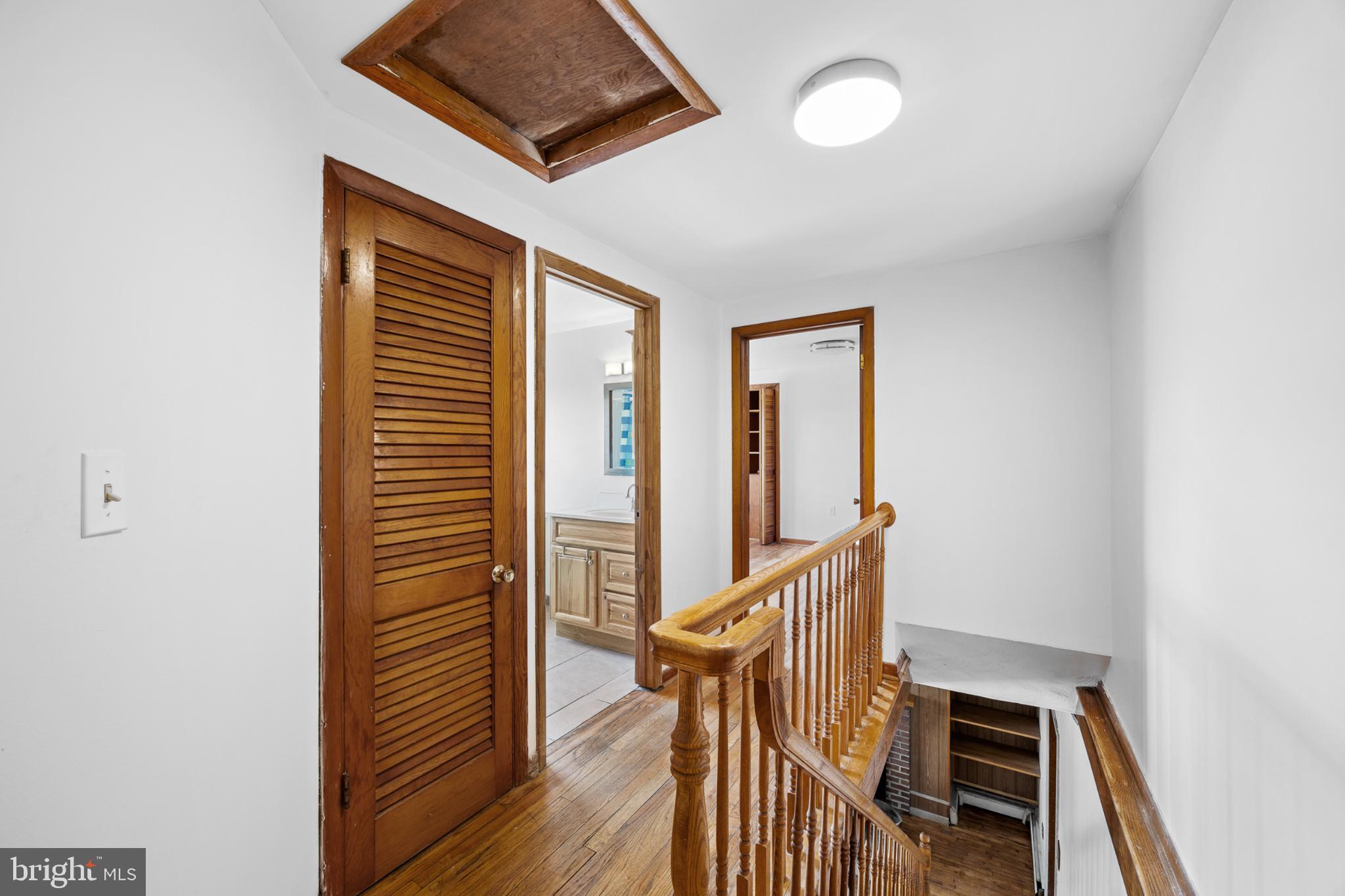 4071 Kabletown Road Charles Town, WV 25414 - Photo 10 of 29 a view of a hallway with wooden floor