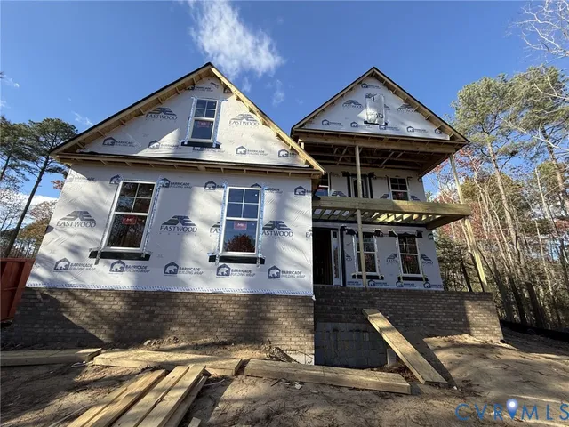 a front view of a house with garage