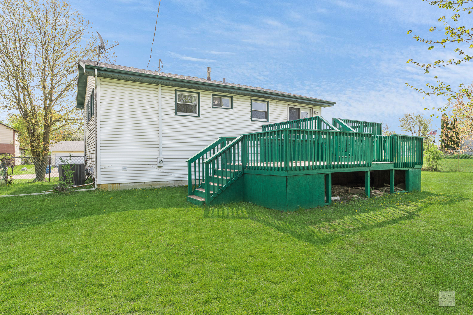 1860 Nottingham Drive Aurora, IL 60505 - Photo 15 of 22 a view of backyard with deck and garden