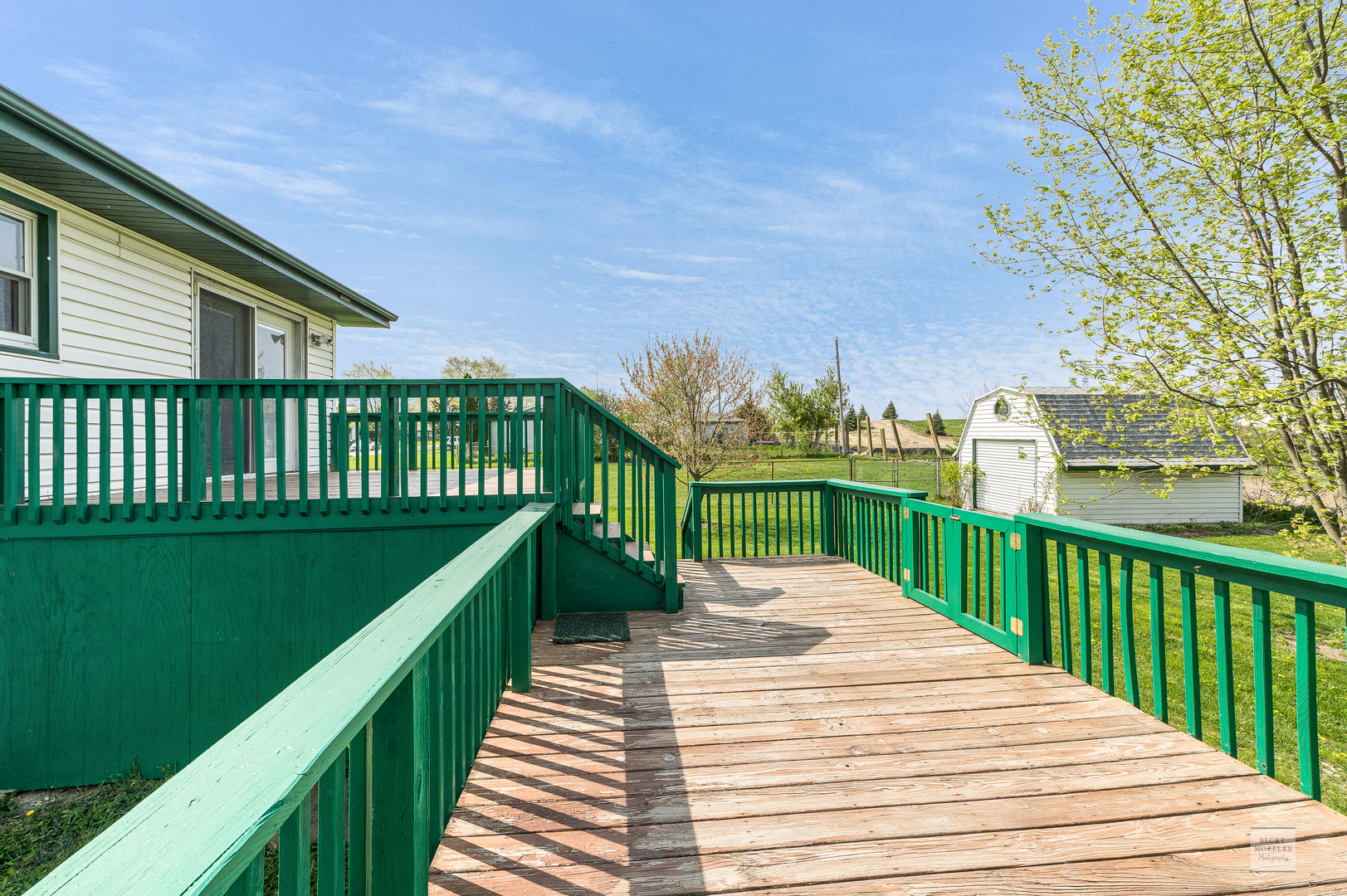1860 Nottingham Drive Aurora, IL 60505 - Photo 17 of 22 a view of a balcony with wooden floor