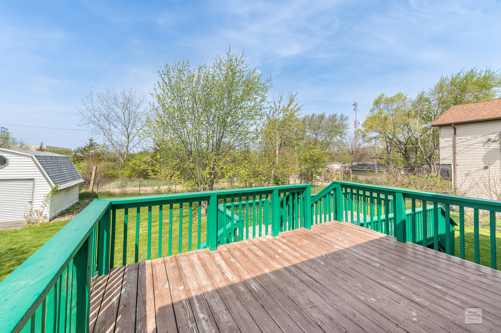1860 Nottingham Drive Aurora, IL 60505 - Photo 18 of 22 a view of balcony with wooden floor and fence