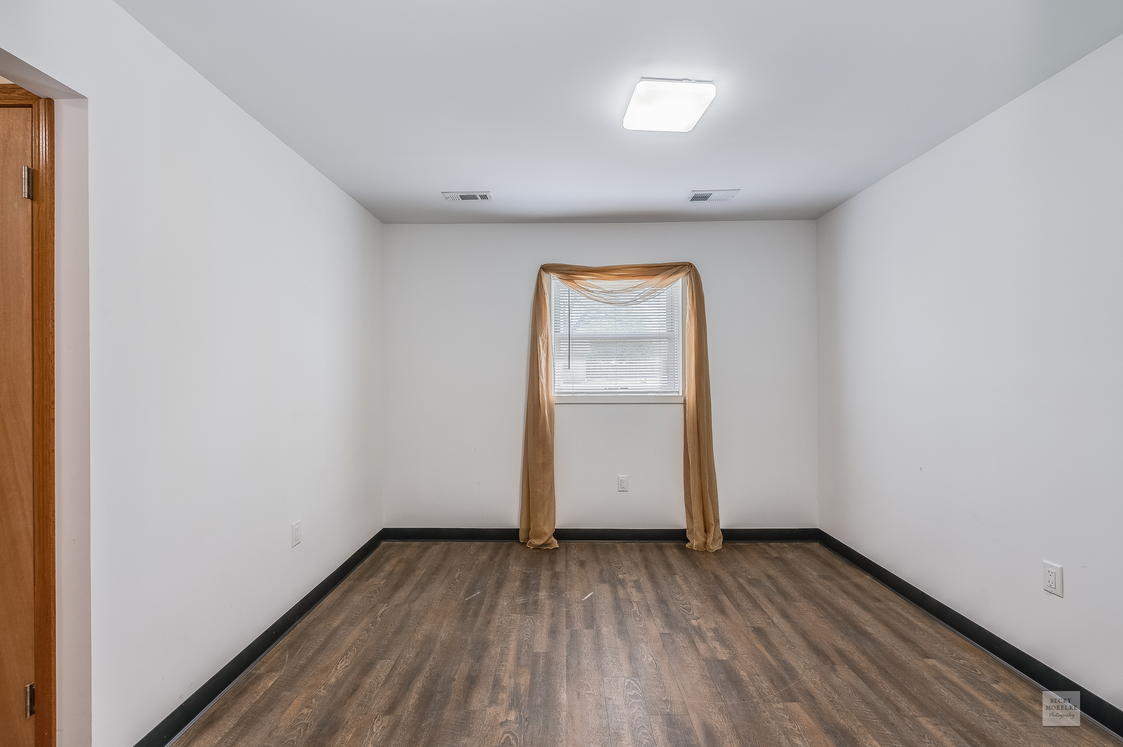 1860 Nottingham Drive Aurora, IL 60505 - Photo 8 of 22 a view of empty room with wooden floor