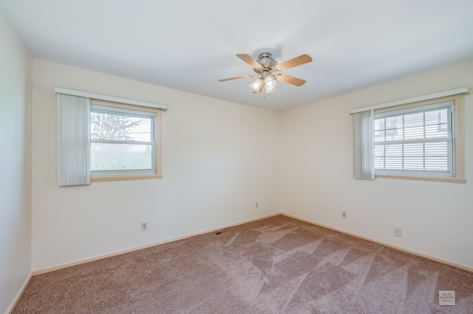 1860 Nottingham Drive Aurora, IL 60505 - Photo 10 of 22 a view of an empty room with a window