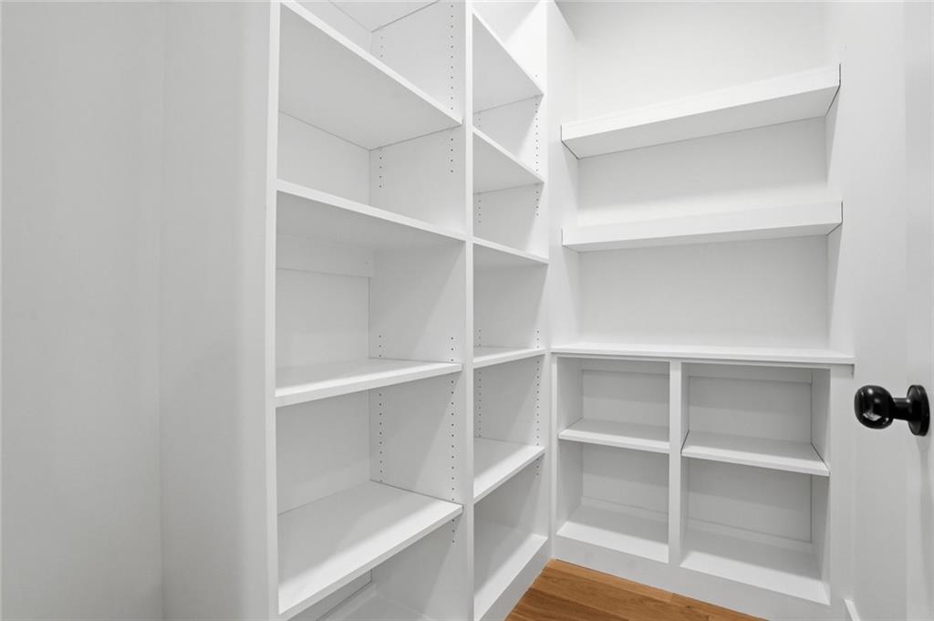 134 Henry Meyer Road Winterville, GA 30683 - Photo 14 of 34 a view of walk in closet with empty racks