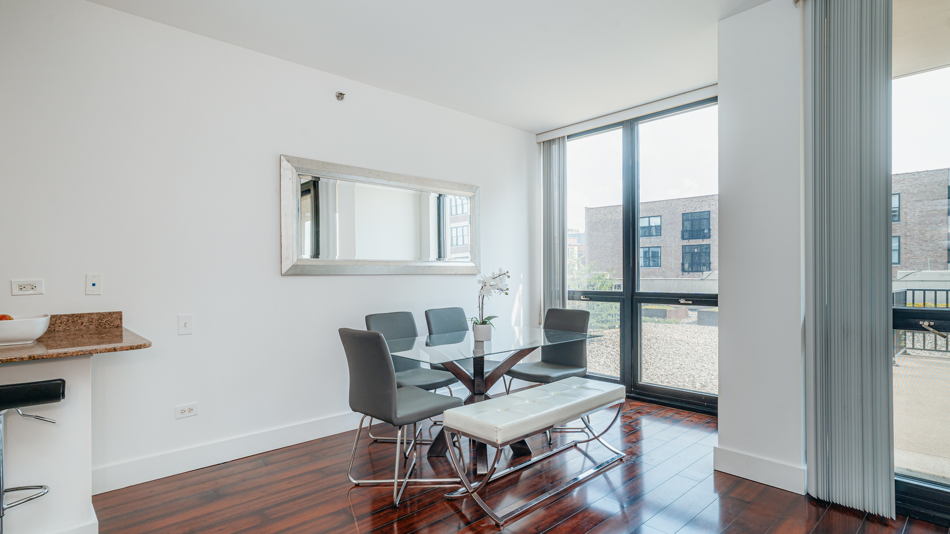 210 South Desplaines Street, Unit 606 Chicago, IL 60661 - Photo 9 of 33 a work room with furniture and a window
