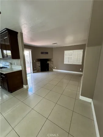 a view of a kitchen with microwave and cabinets
