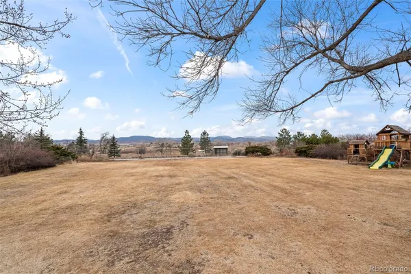 a view of a road with a yard