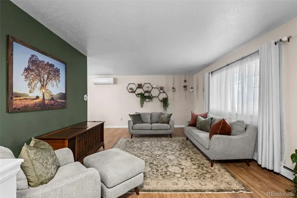 a living room with furniture and a couch