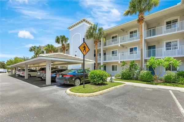 a view of street with parked cars