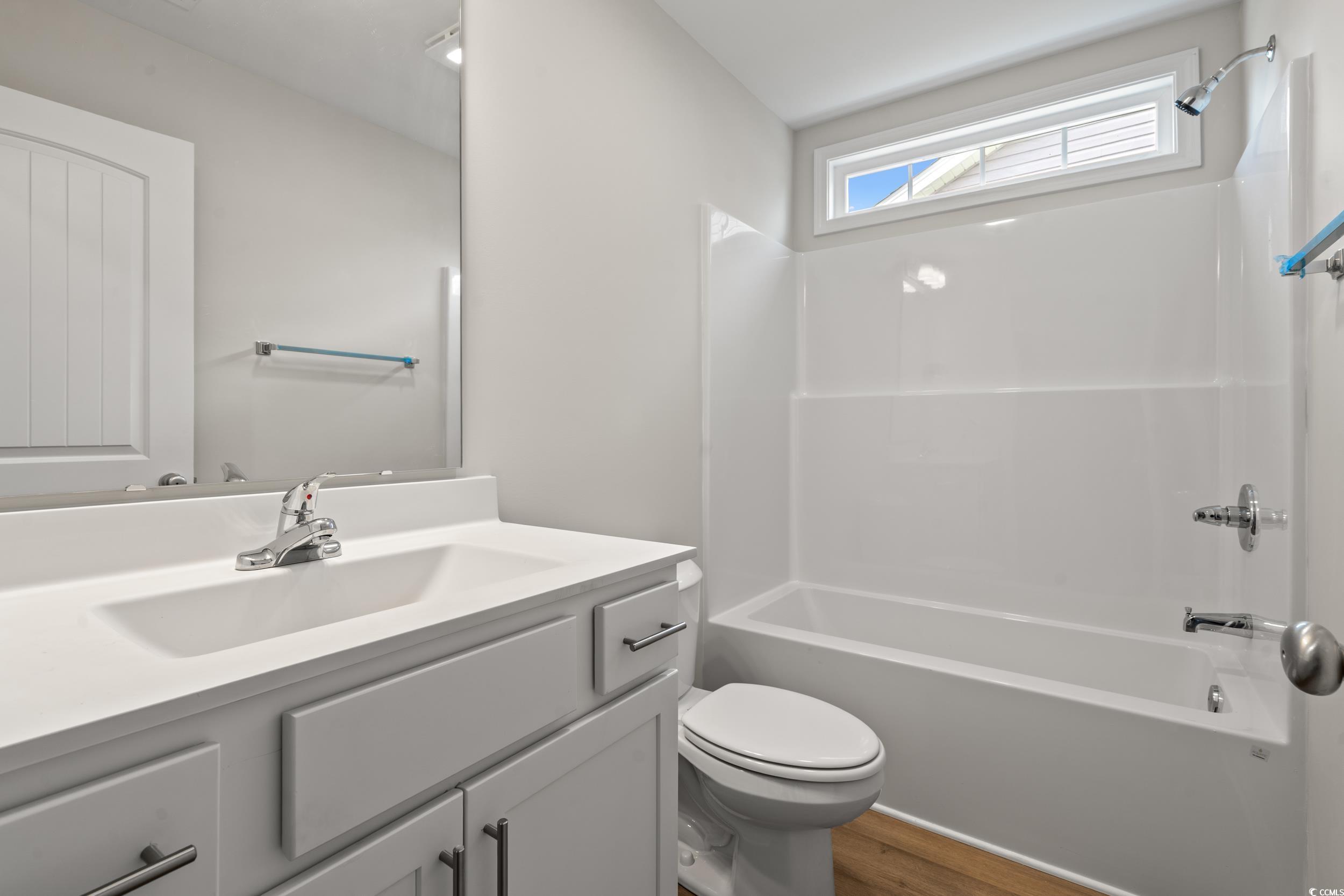625 Woodside Drive Conway, SC 29526 - Photo 17 of 37 Bathroom featuring vanity, bathing tub / shower co