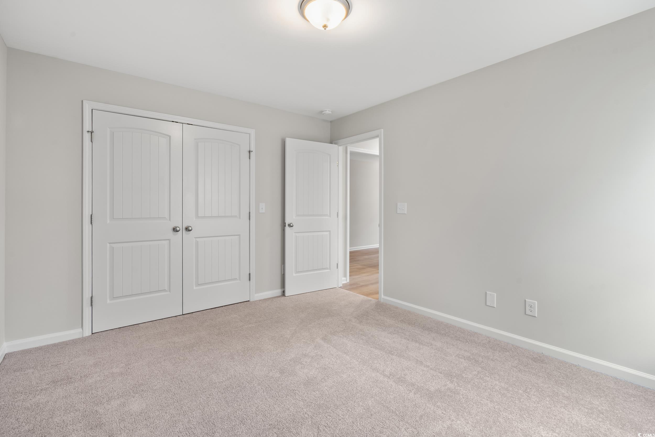 625 Woodside Drive Conway, SC 29526 - Photo 19 of 37 Unfurnished bedroom featuring carpet flooring and
