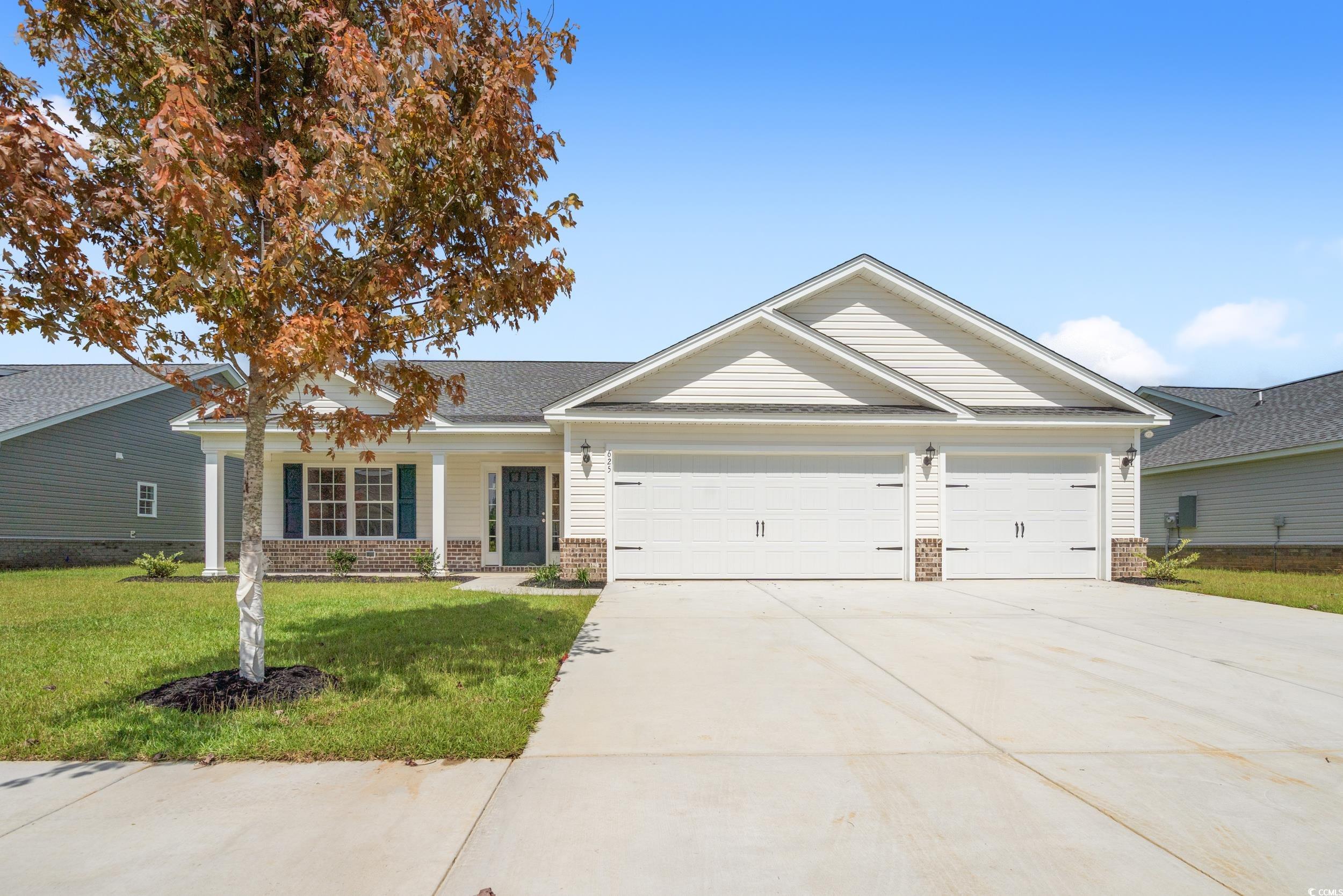 625 Woodside Drive Conway, SC 29526 - Photo 2 of 37 Single story home with brick siding, concrete driv