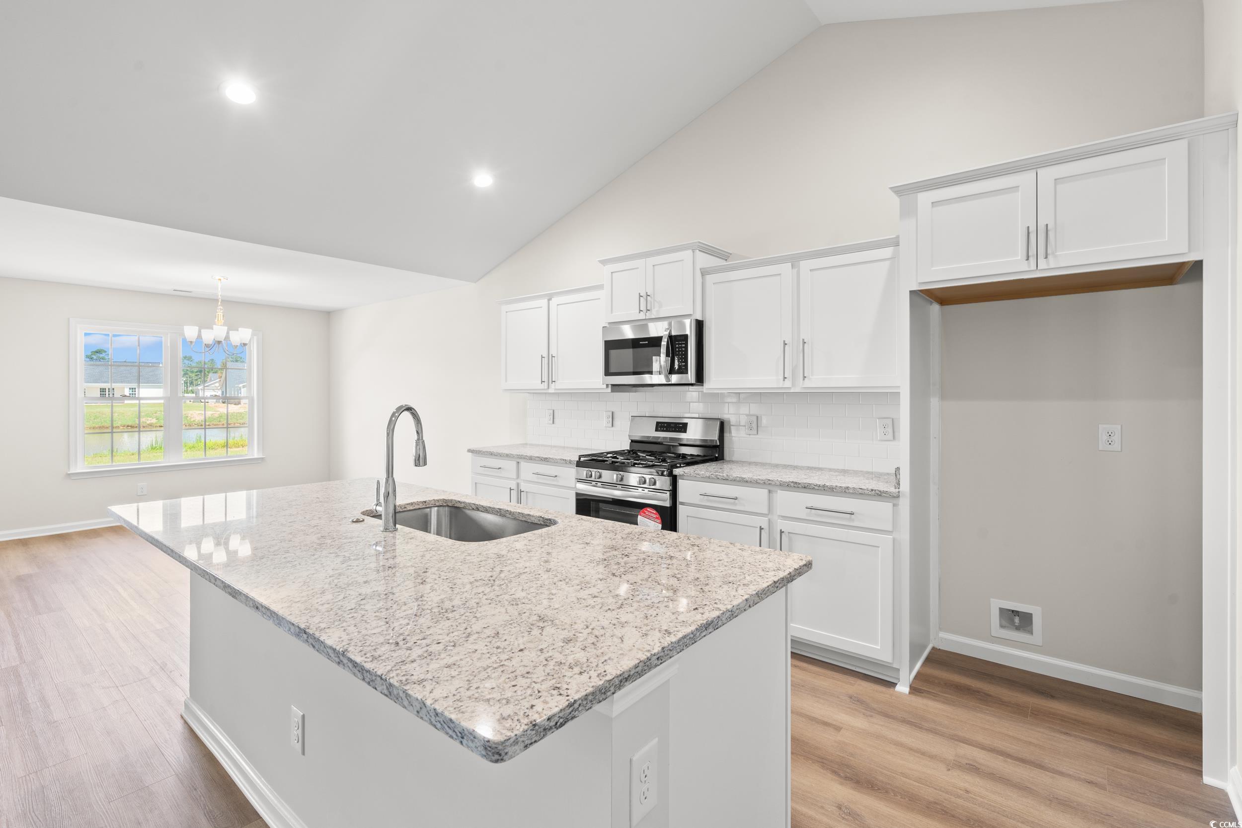 625 Woodside Drive Conway, SC 29526 - Photo 8 of 37 Kitchen with stainless steel appliances, light woo