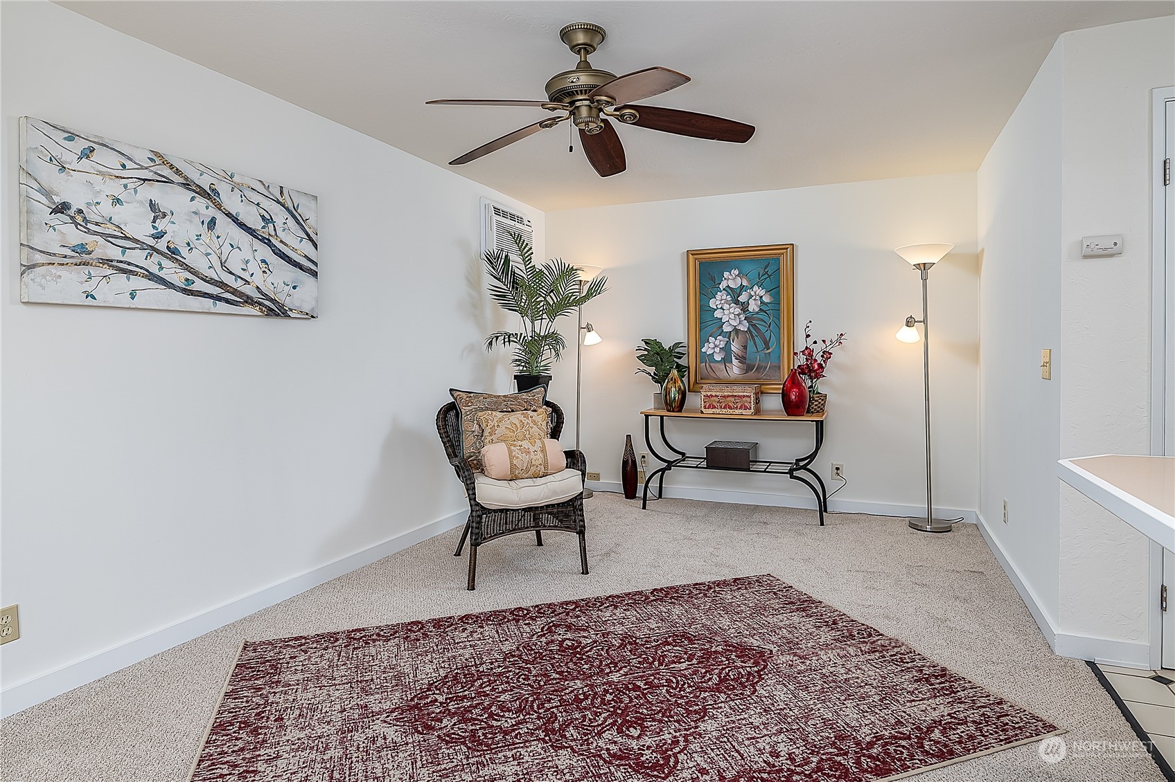 4007 Northeast 22nd Place Renton, WA 98056 - Photo 12 of 29 a living room with furniture and a rug