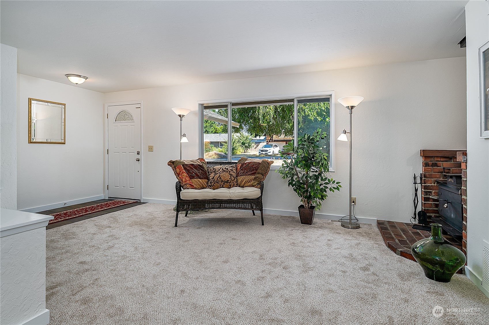 4007 Northeast 22nd Place Renton, WA 98056 - Photo 4 of 29 a living room with furniture and a window
