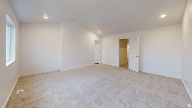 777 Pheasantbrook Drive, Unit 2B Centerville, UT 84014 - Photo 21 of 42 Spacious room featuring light-toned carpeting, white walls, recessed lighting, and a window providing natural light