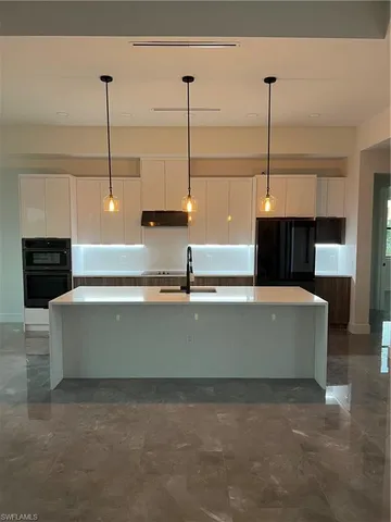 $949,000 | 2594 43rd Avenue Northeast, Naples, FL 34120