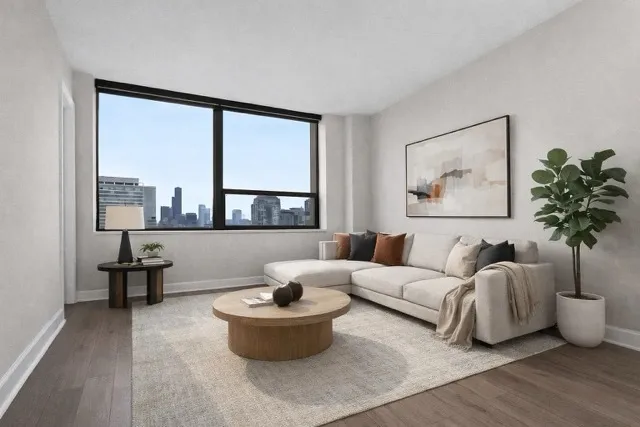 a living room with furniture and a large window