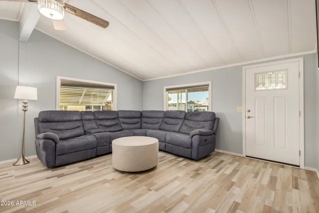 a living room with furniture and a window